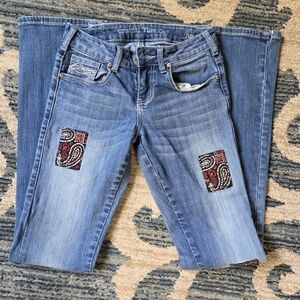 Cowgirl Tuff Women's Boot Cut Jeans - Blue with Red Paisley Patch Accents